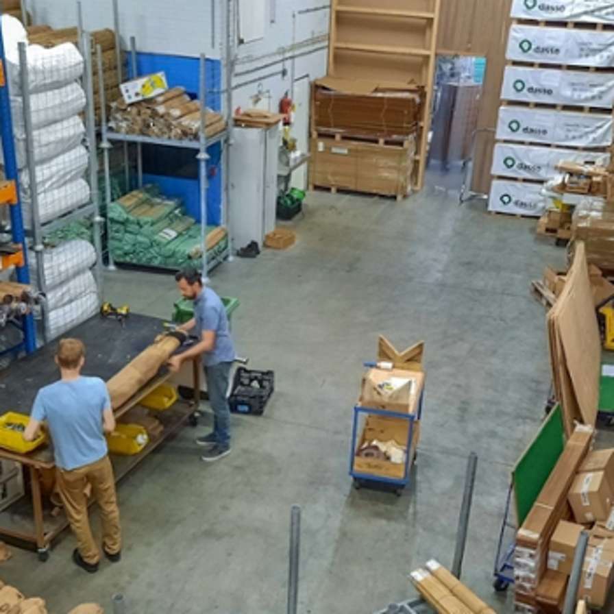 People working in warehouse.