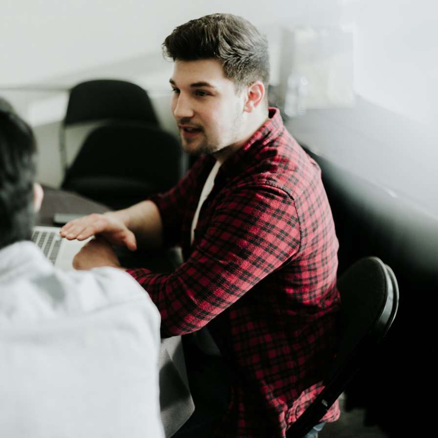 Two men discussing things.