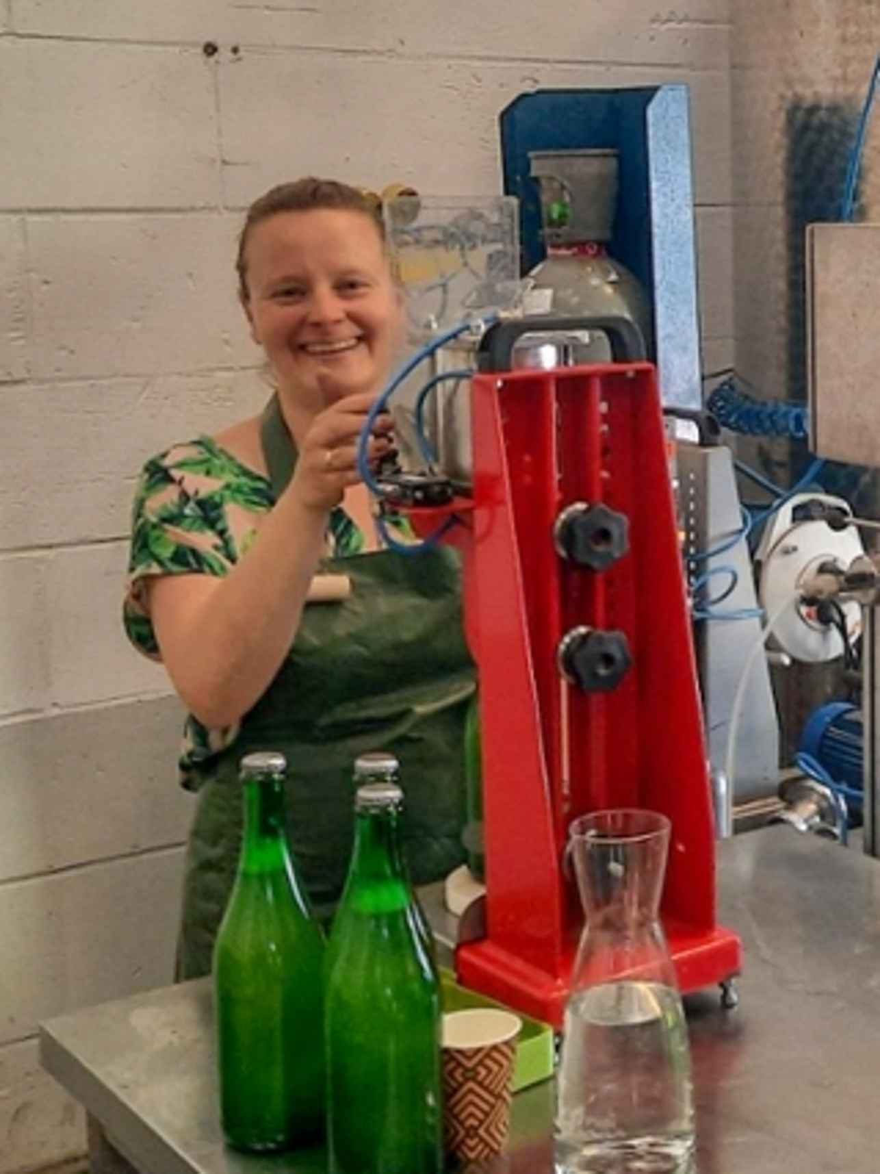 Woman filling a bottle.