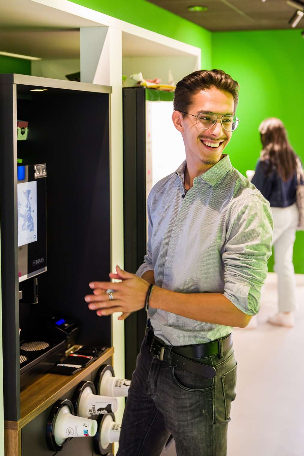 Drie studenten met een laptop