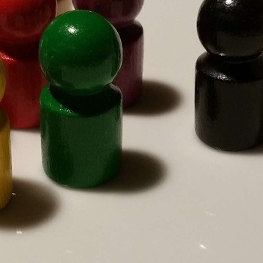 Gekleurde pionnen.