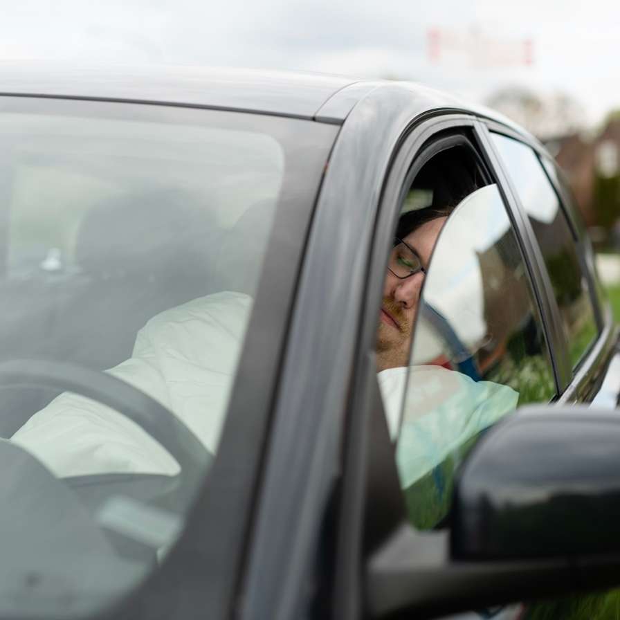 Dakloze in auto