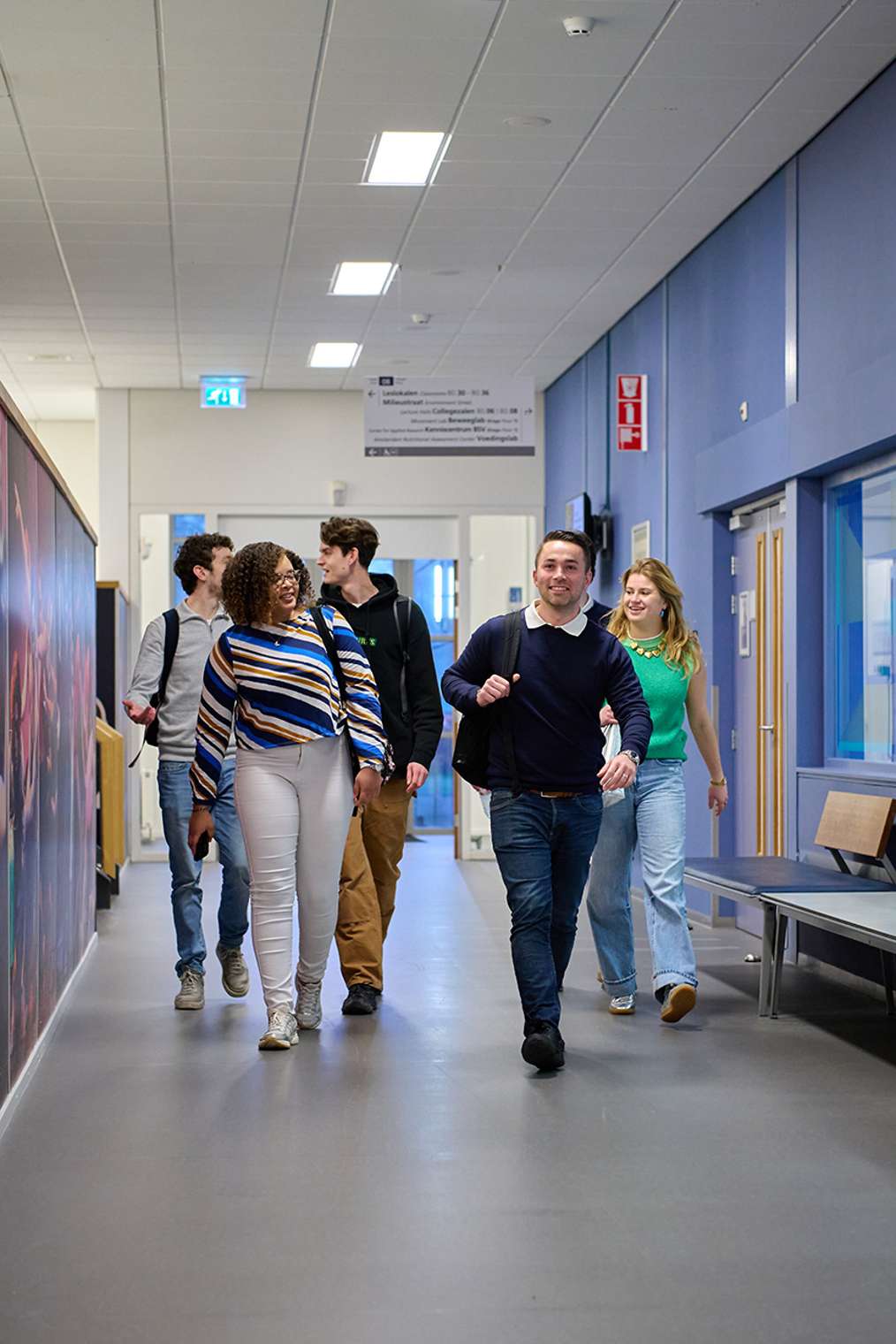Students Master Sport Business & Leadership AUAS walking through campus building