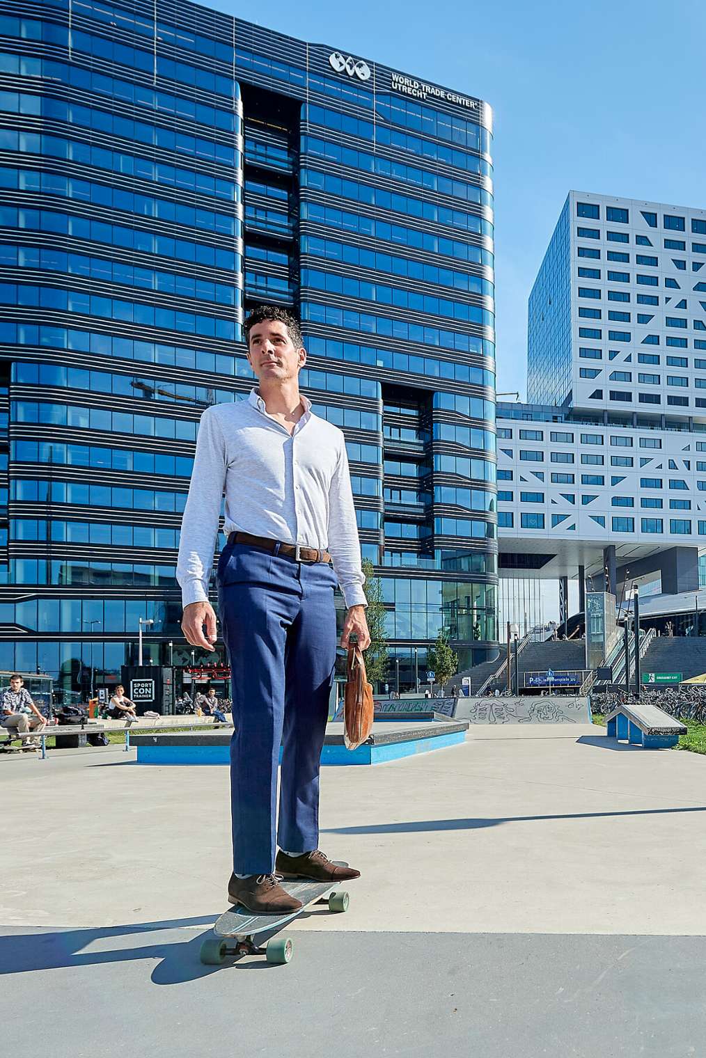 Sport Studies business man on skateboard