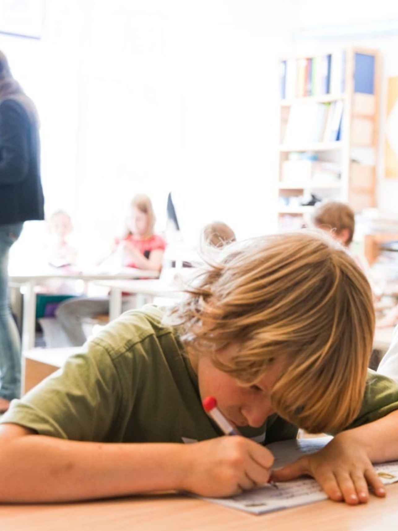 een schrijvende leerling