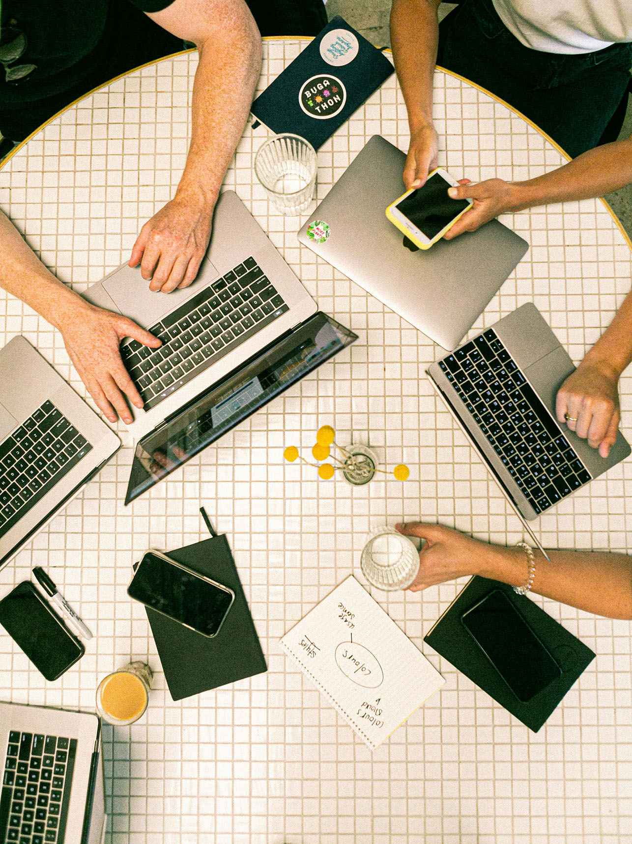 People collaborating around a table.